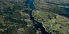 Flyfotoet viser ytre del av Viksefjorden, med Krokane i den vesle bukta øvst og omtrent midt på bildet. Ifølgje folk som er kjent på staden er huset til Smørsundkjerringa borte, berre litt av murane står att. Foto: Irene Jacobsen