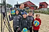 Simon Stalsberg Aase, Markus F. Knutsen, Bjørn Tore Larsen og Herman Salte-Enoksen har hatt det gøy på sandvolleyballskule. Sunniva Rossebø har vore ein av aktivitetsleiarane.